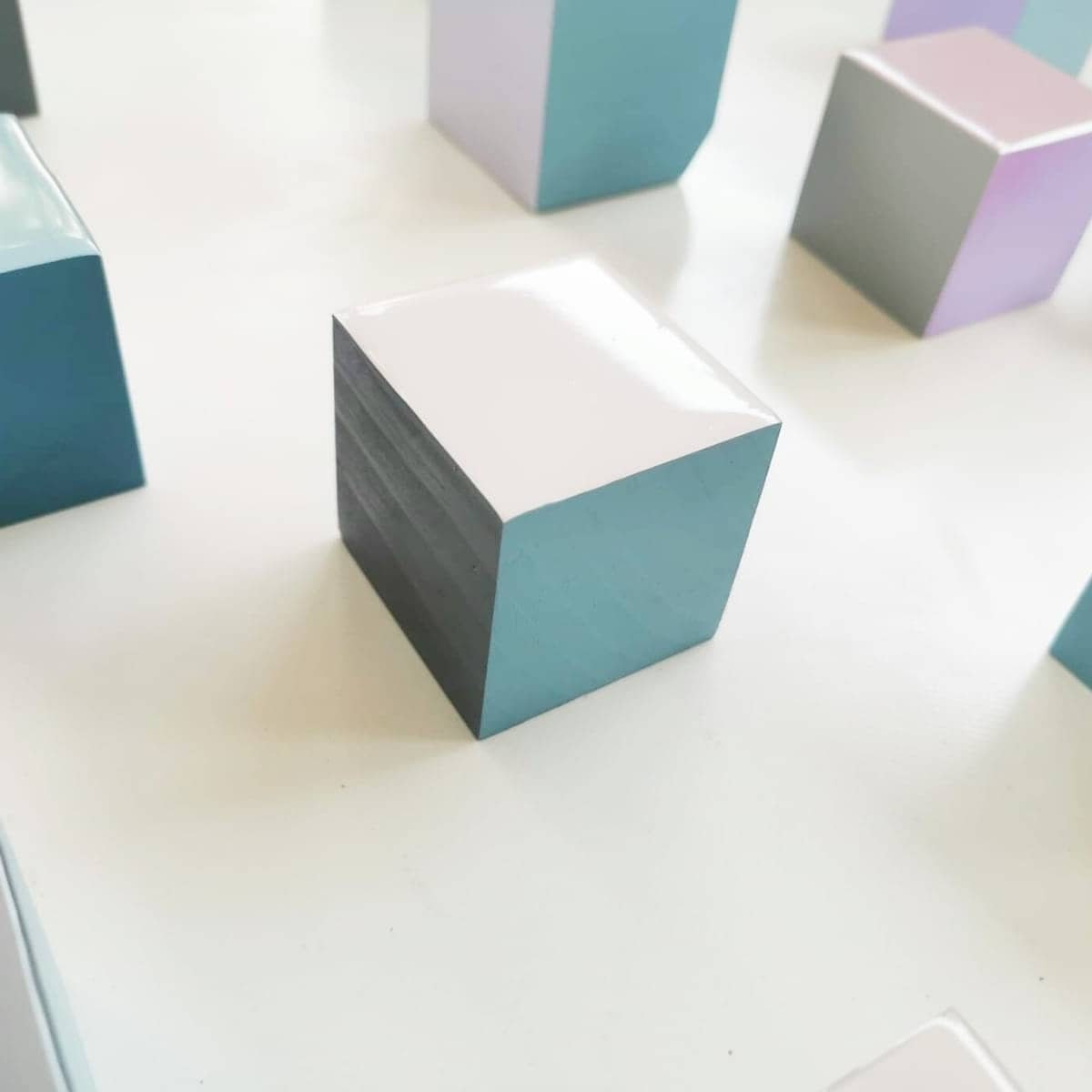 Choose the number of Self install wall art cubes. PACKS of hand painted colored wood cubes with high quality,shiny epoxy resin front face.©