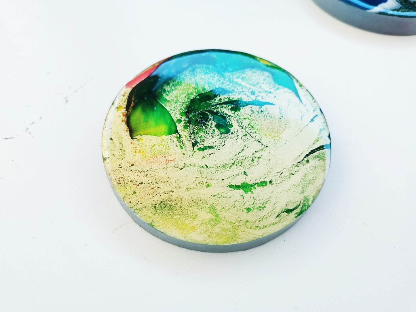 Hand painted 3d Installation. Happy and colorful wall art with resin finish on top. Each circle is a unique work of art. Glossy and shiny ©