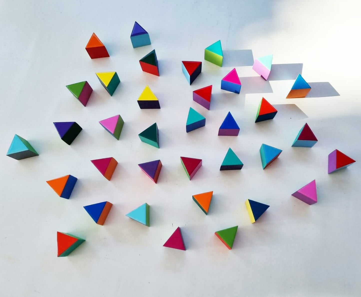 PACKS of hand painted colored triangles with high quality,shiny epoxy resin front face.Choose the number of Self install wall art triangles©