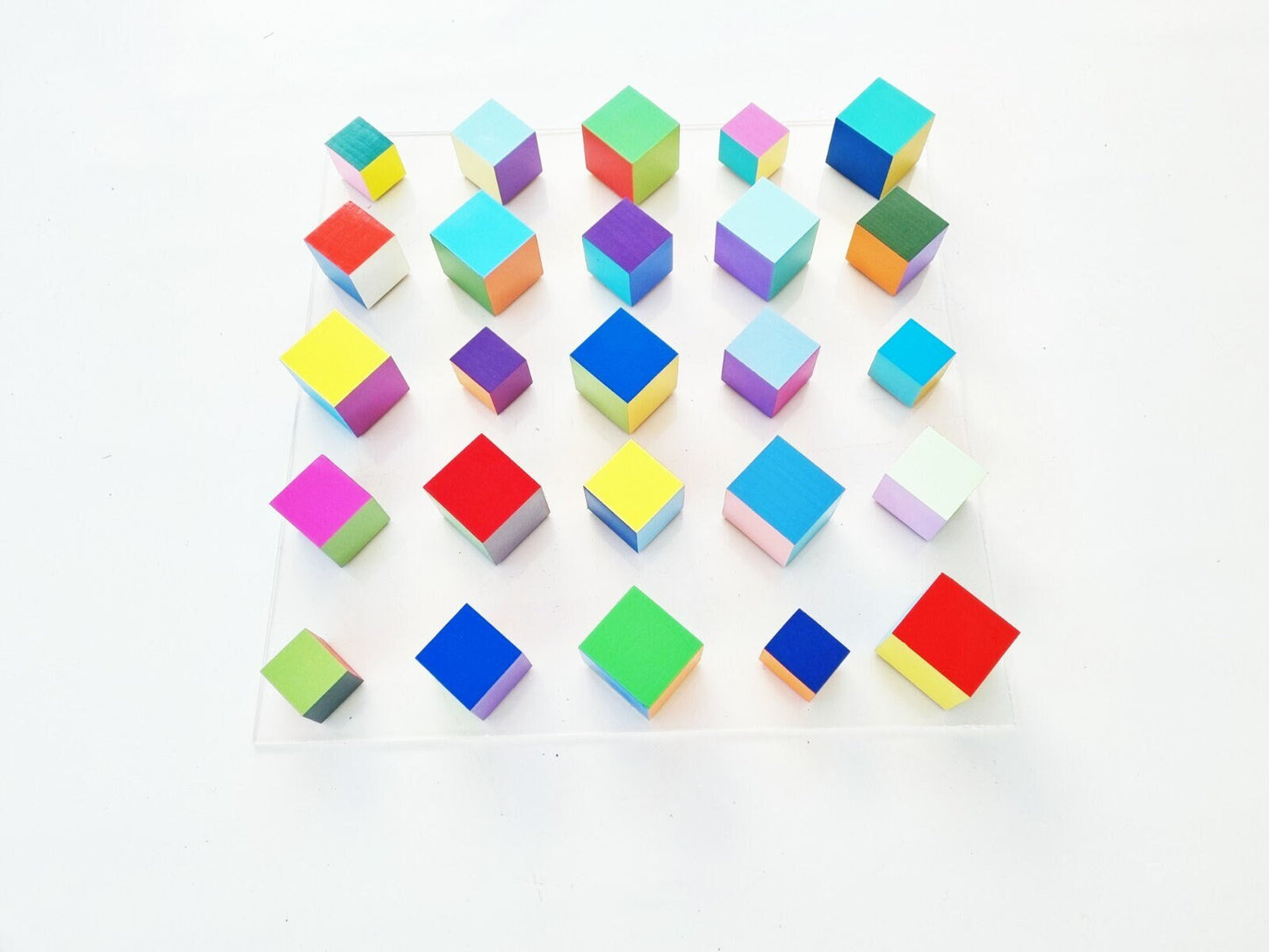 Multi colored wood art in bright and bold happy colors , geometric wood cubes, Abstract and modern wall art. Hand made & hand painted. ©