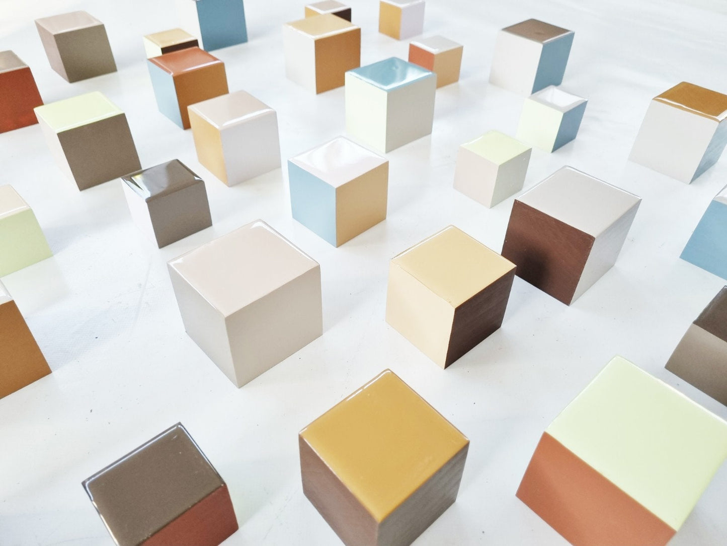 Art installation in neutral, natural soft colors. 3d cube art. Hand painted blocks with high quality,shiny epoxy resin front face.