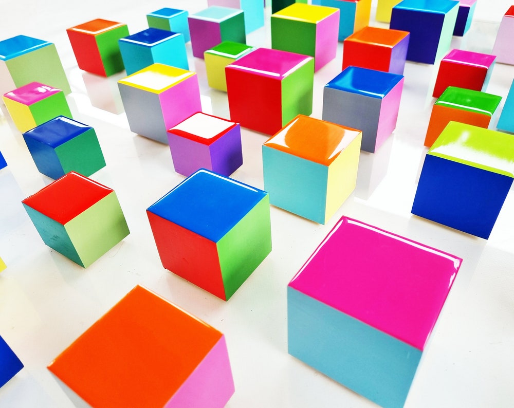 PACKS of hand painted colored wooden cubes with high quality, shiny epoxy resin front face. Choose the number of Self install wall art blocks ©