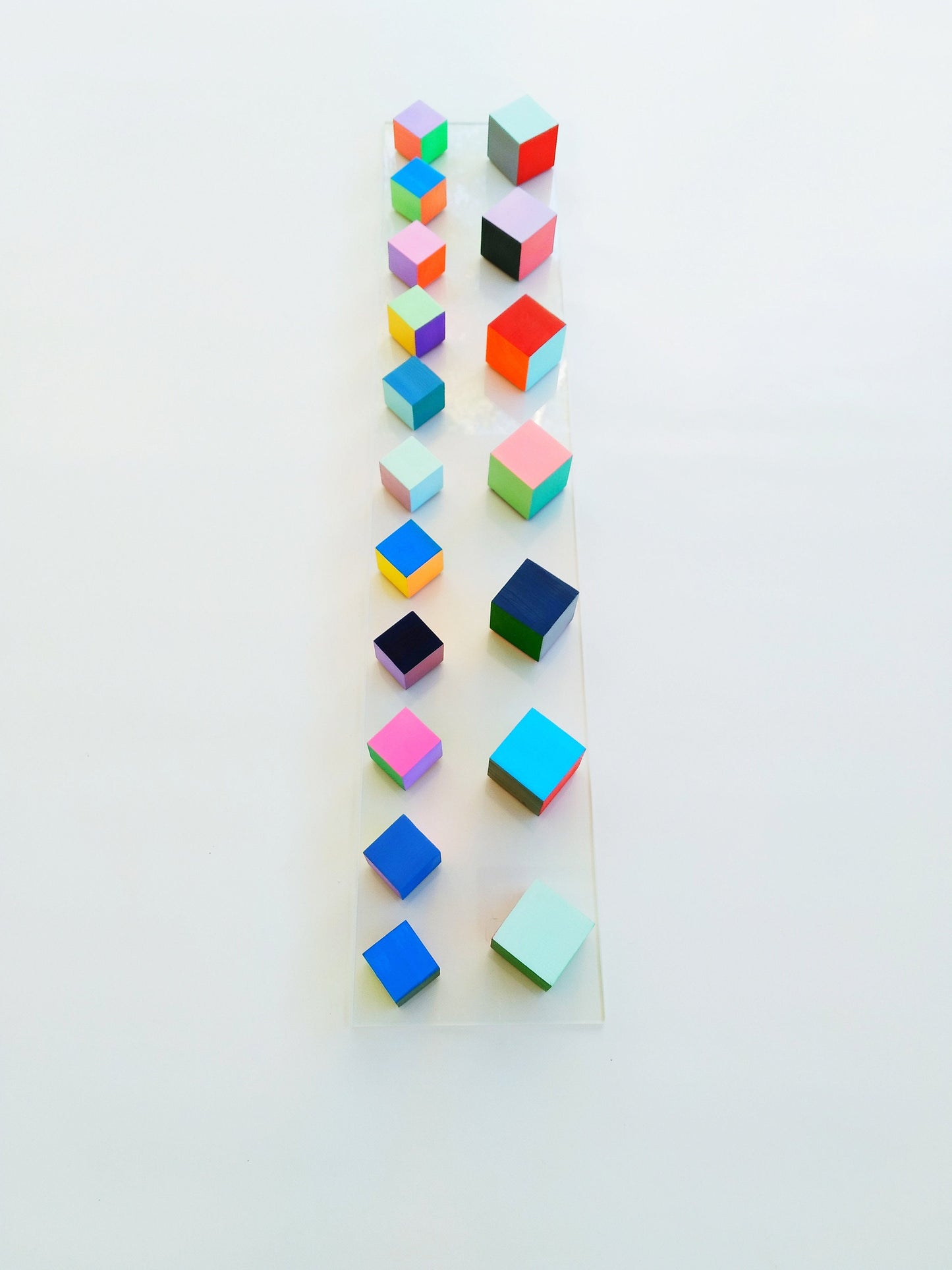 3D Wood cubes ©, hand painted in bright colors. Perfect for hanging in elongated spaces like pillars, columns, beams. sculpture, modern art.