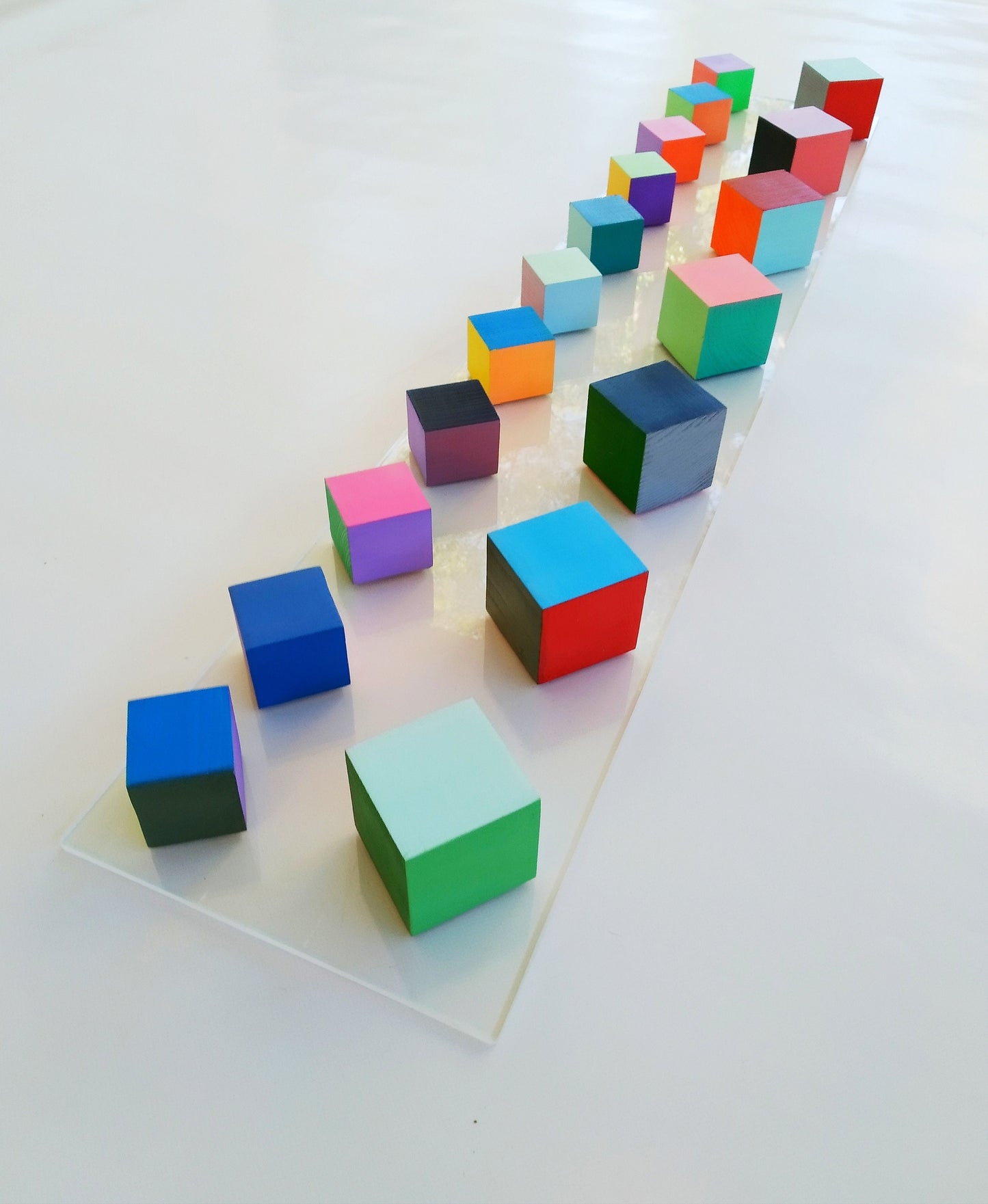 3D Wood cubes ©, hand painted in bright colors. Perfect for hanging in elongated spaces like pillars, columns, beams. sculpture, modern art.