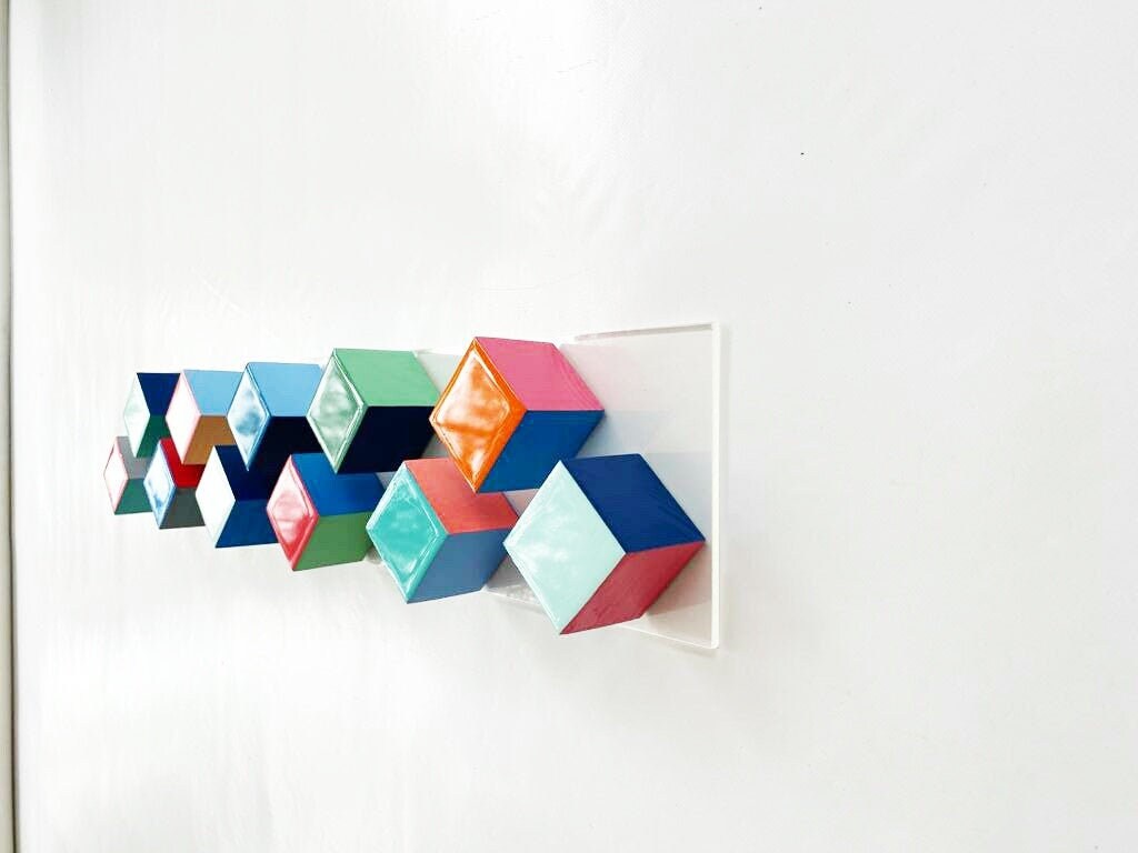 Wood art, geometric and modern wall art. Wood art cube sculpture with resin finish on the top face. Rainbow wall art, long and narrow art.