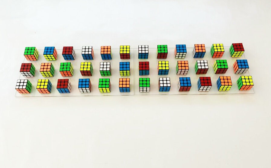 Original and unique Rubiks Cube wall art. 2 Rectangular bases 25" X 12.2" Magic cube puzzle wall piece ©. Perfect decoration for children