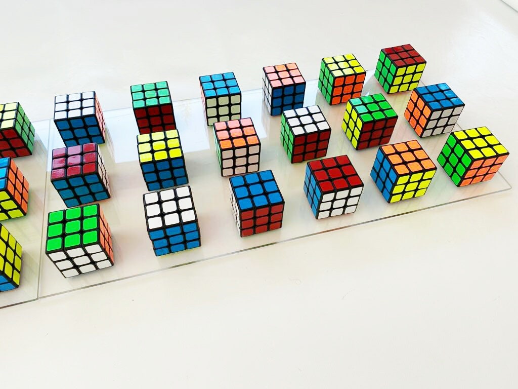 Original and unique Rubiks Cube wall art. 2 Rectangular bases 25" X 12.2" Magic cube puzzle wall piece ©. Perfect decoration for children