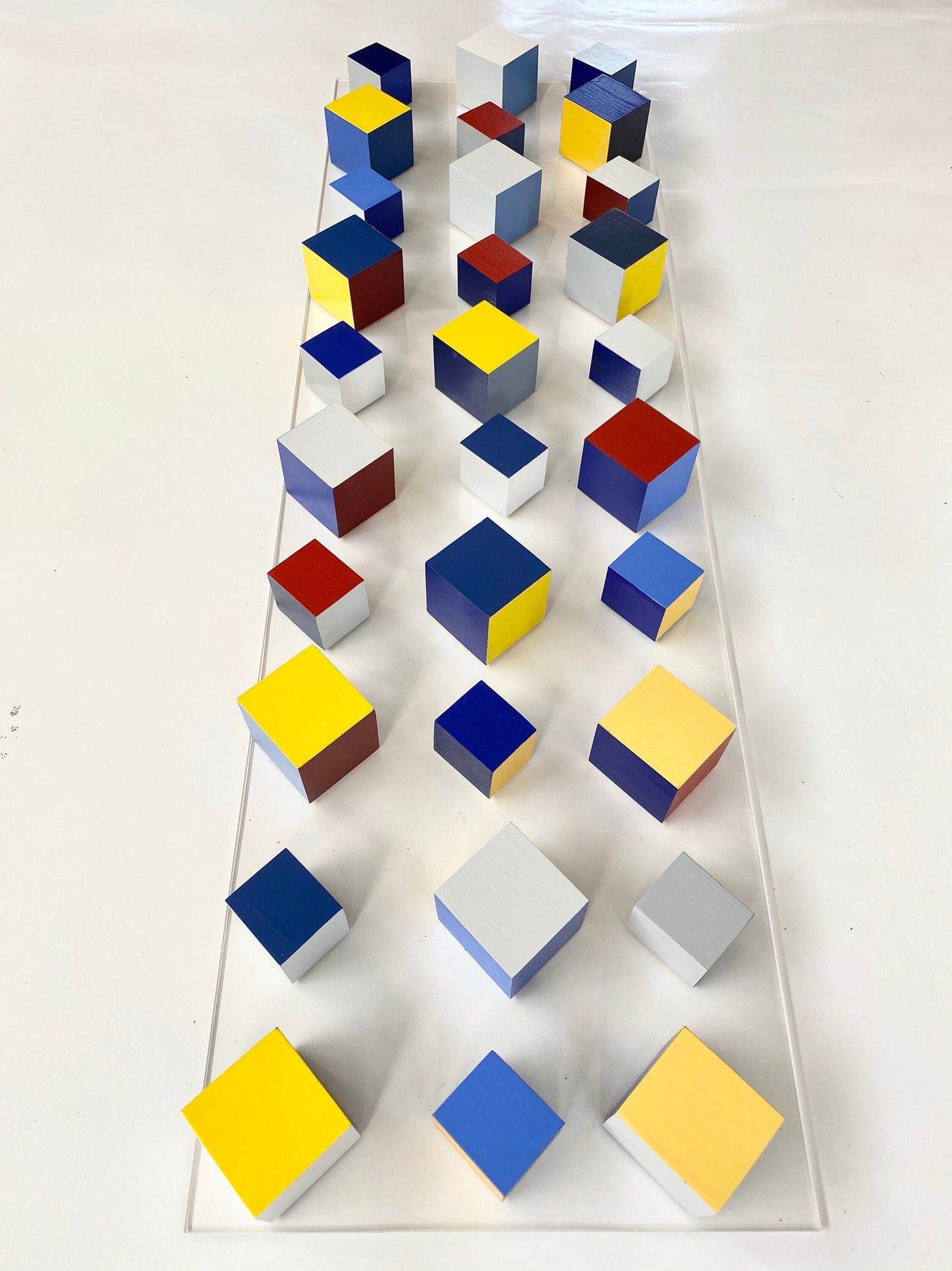 Wood wall art, geometric and modern design in happy bold colors. Rectangular large long narrow. It can be hung vertically or horizontally. ©