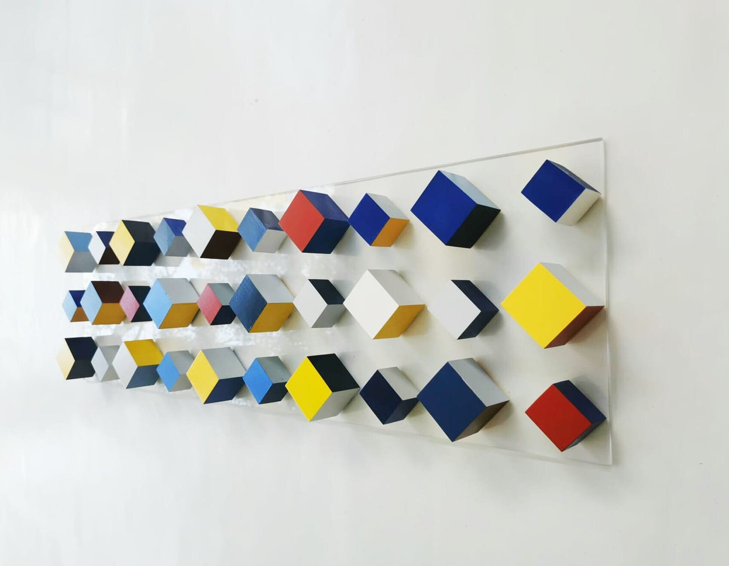 Wood wall art, geometric and modern design in happy bold colors. Rectangular large long narrow. It can be hung vertically or horizontally. ©