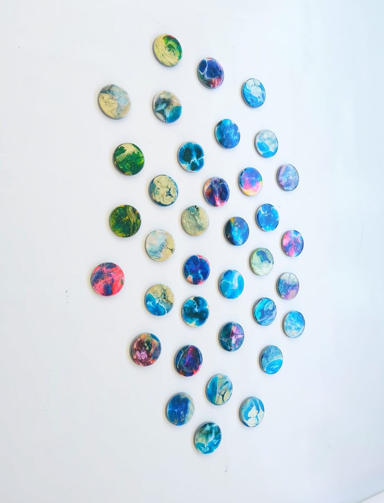 Hand painted 3d Installation. Happy and colorful wall art with resin finish on top. Each circle is a unique work of art. Glossy and shiny  ©