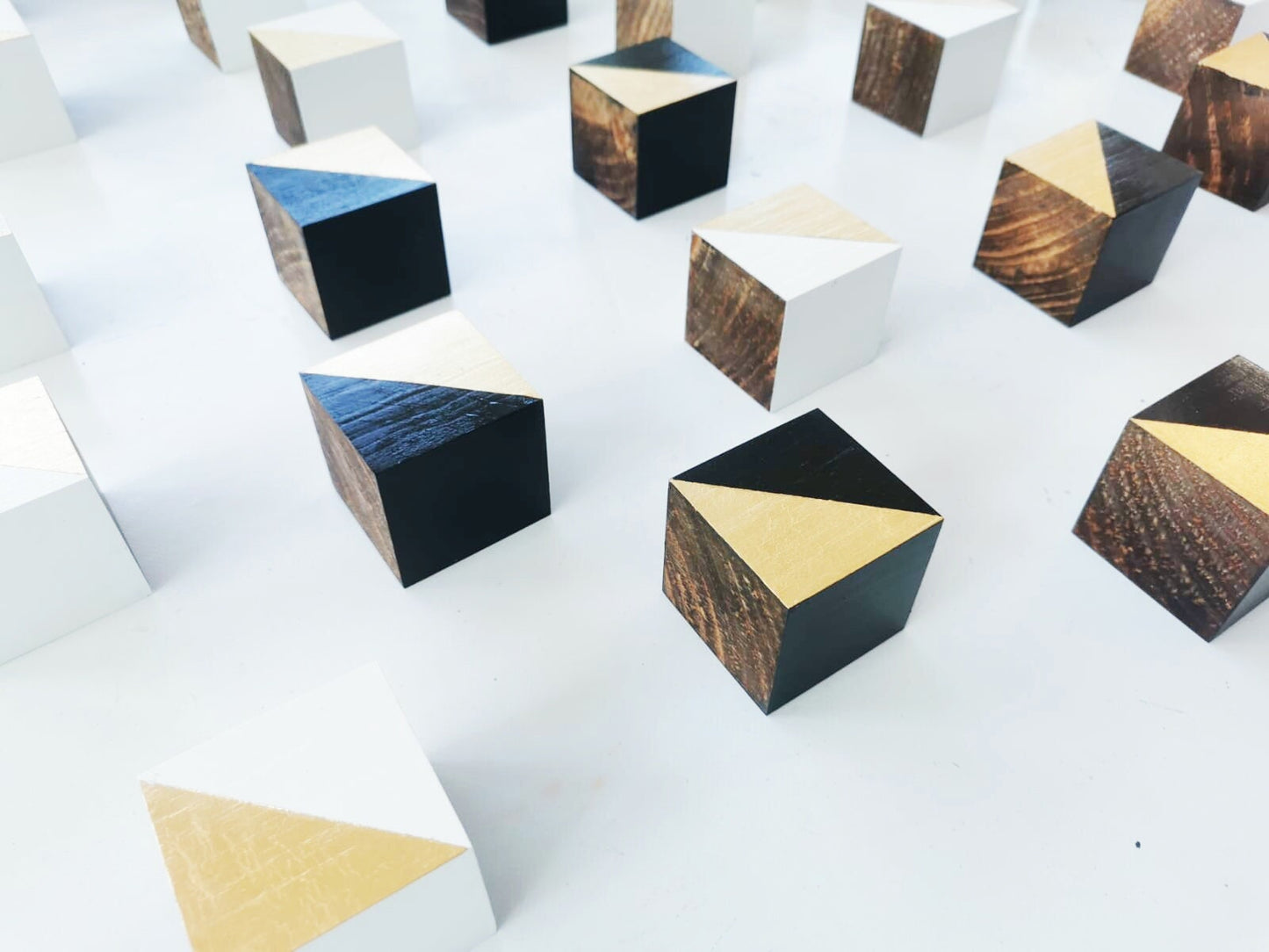 Modern Sculpture 3D wood wall art. Hand-painted wooden cubes with gold leaf, Black and White. You can choose the number of wood cubes ©