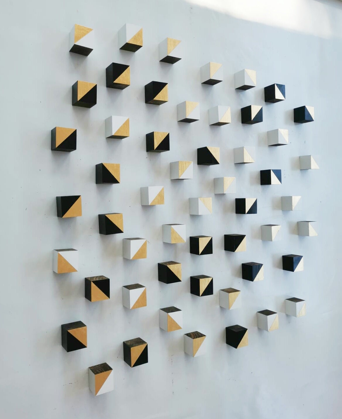 Modern Sculpture 3D wood wall art. Hand-painted wooden cubes with gold leaf, Black and White. You can choose the number of wood cubes ©