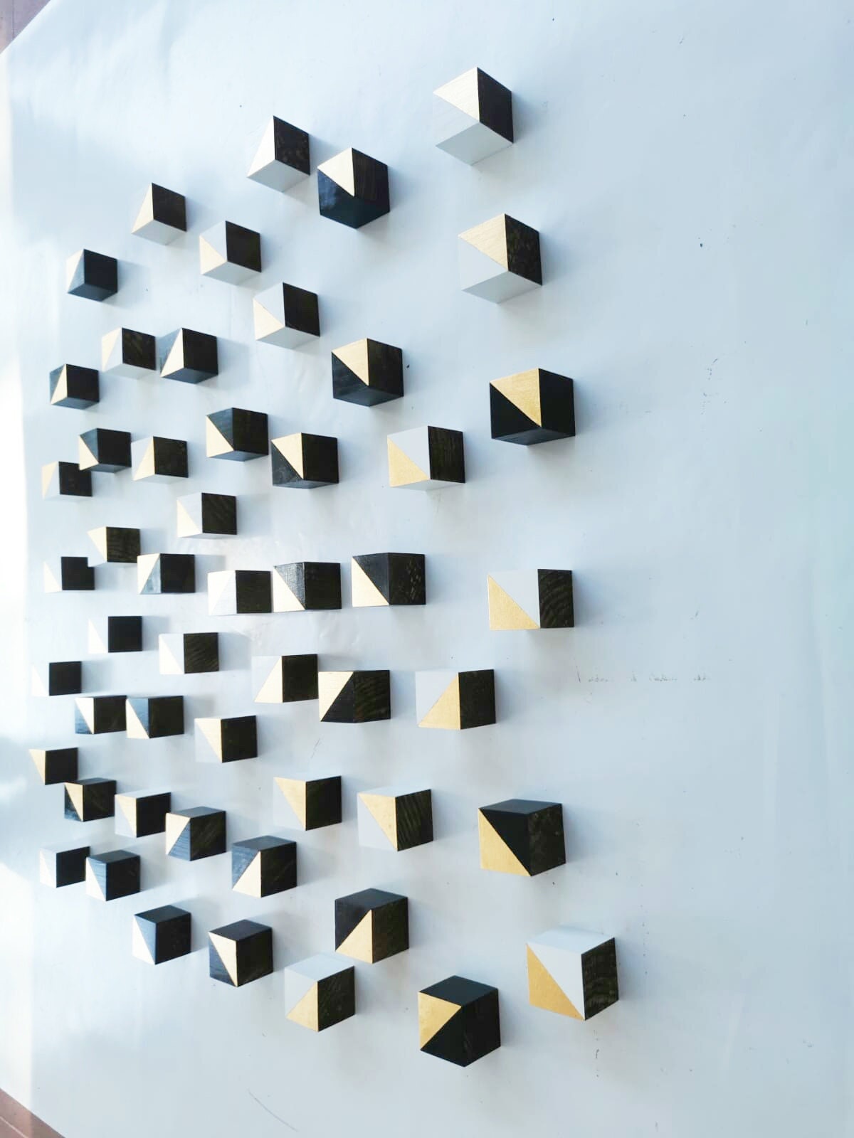 Modern Sculpture 3D wood wall art. Hand-painted wooden cubes with gold leaf, Black and White. You can choose the number of wood cubes ©