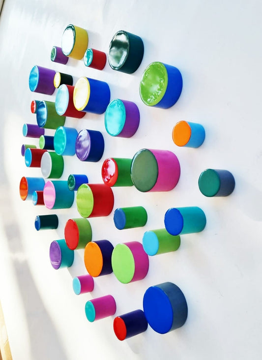 PACKS of hand painted colored cylinders with high quality,shiny epoxy resin front face.Choose the number of Self install wall art Cylinders©