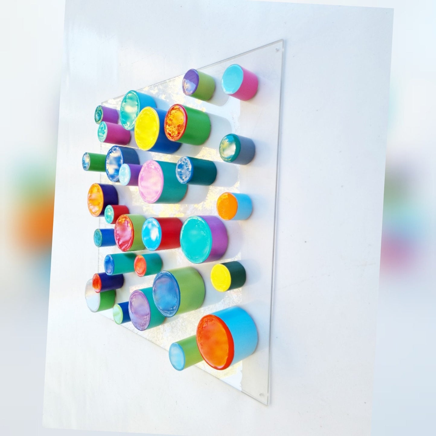 Wood wall art in happy colors and resin finish on top. Hand painted cylinders with different heights and sizes. 3d art. Wood sculpture ©