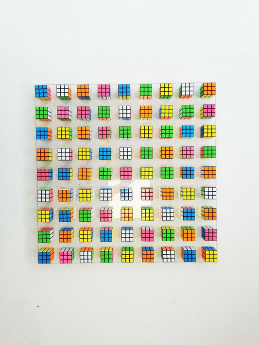 Unique Rubiks Cube wall art. © Magic cube puzzle wall piece. Original retro vintage toy Rubik cube art piece. 80s nostalgia puzzle picture.