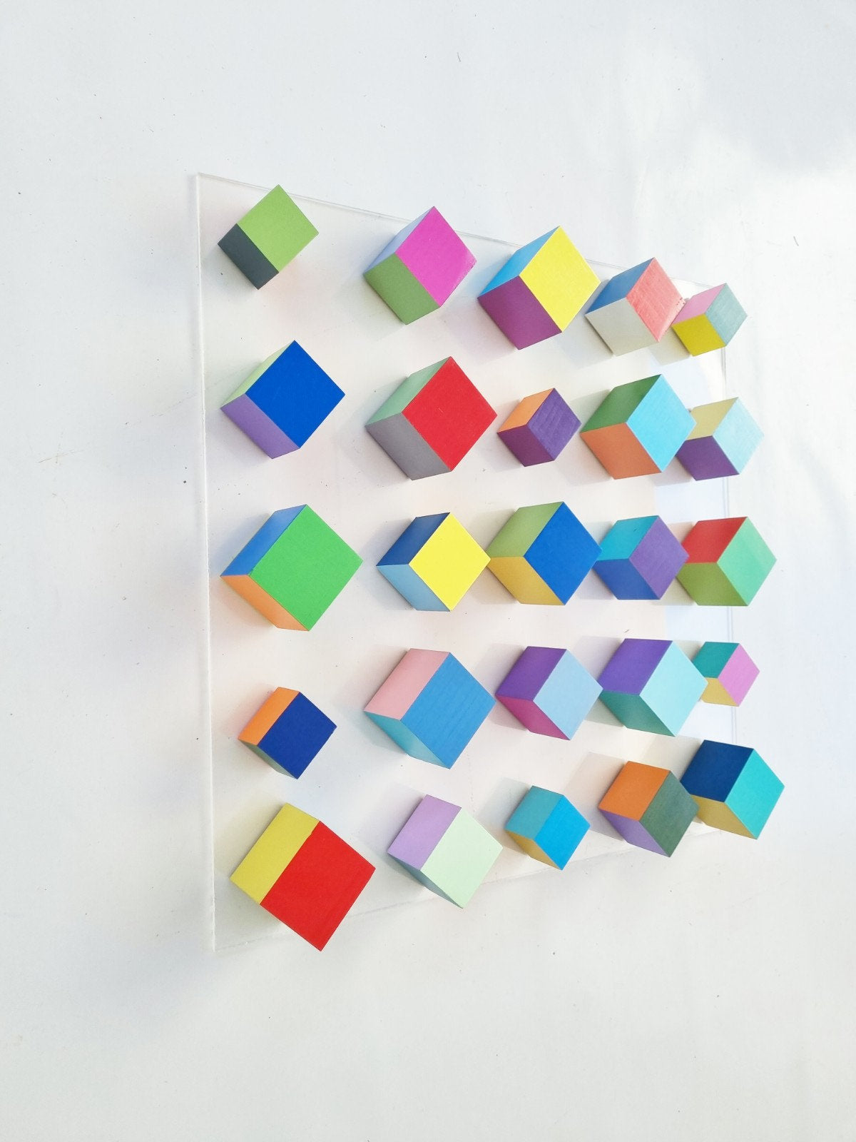 Multi colored wood art in bright and bold happy colors , geometric wood cubes, Abstract and modern wall art. Hand made & hand painted. ©