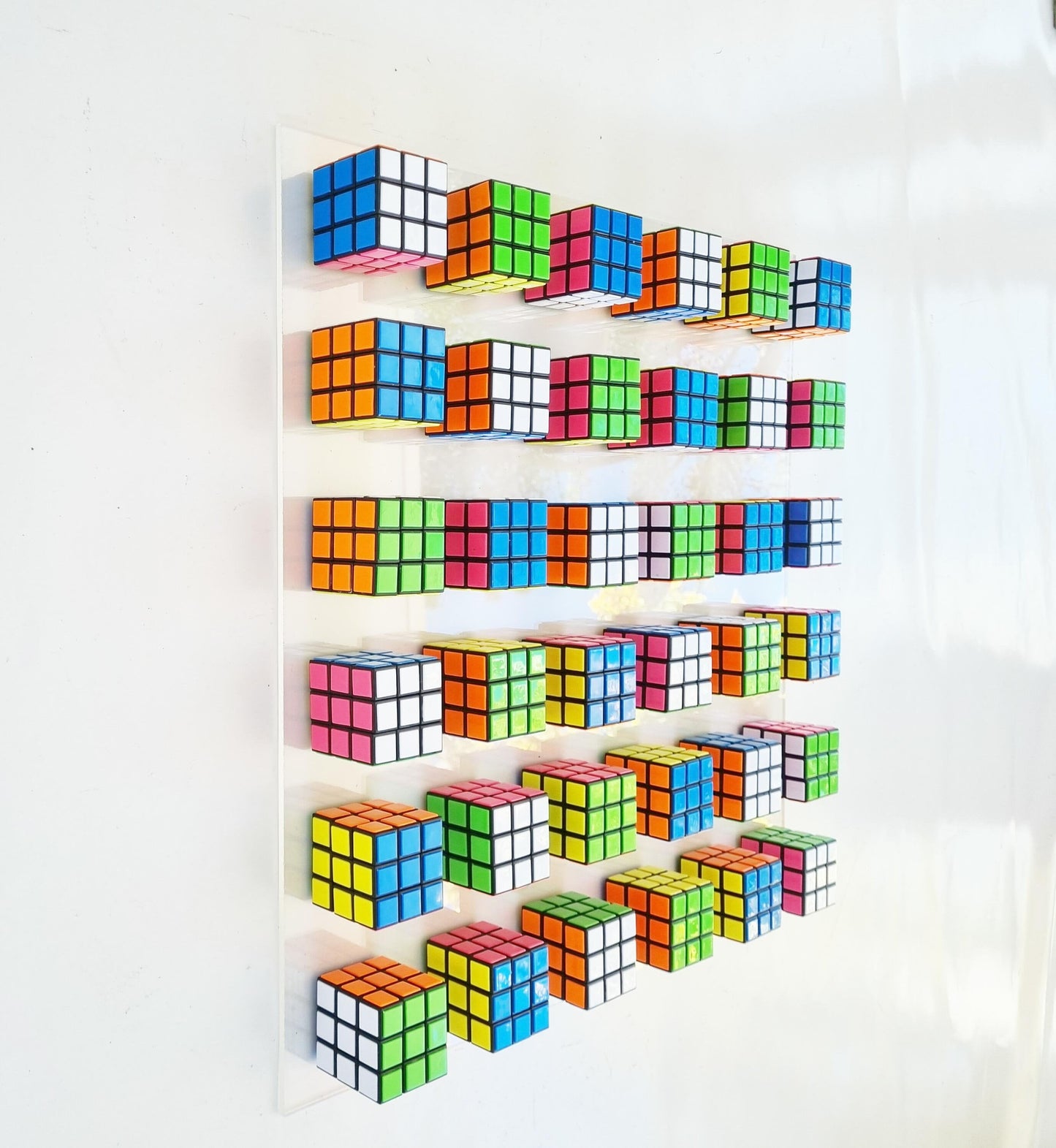 Magic cube puzzle wall piece Unique Rubiks Cube wall art. ©. Original retro vintage toy Rubik cube art piece. 80s nostalgia puzzle picture