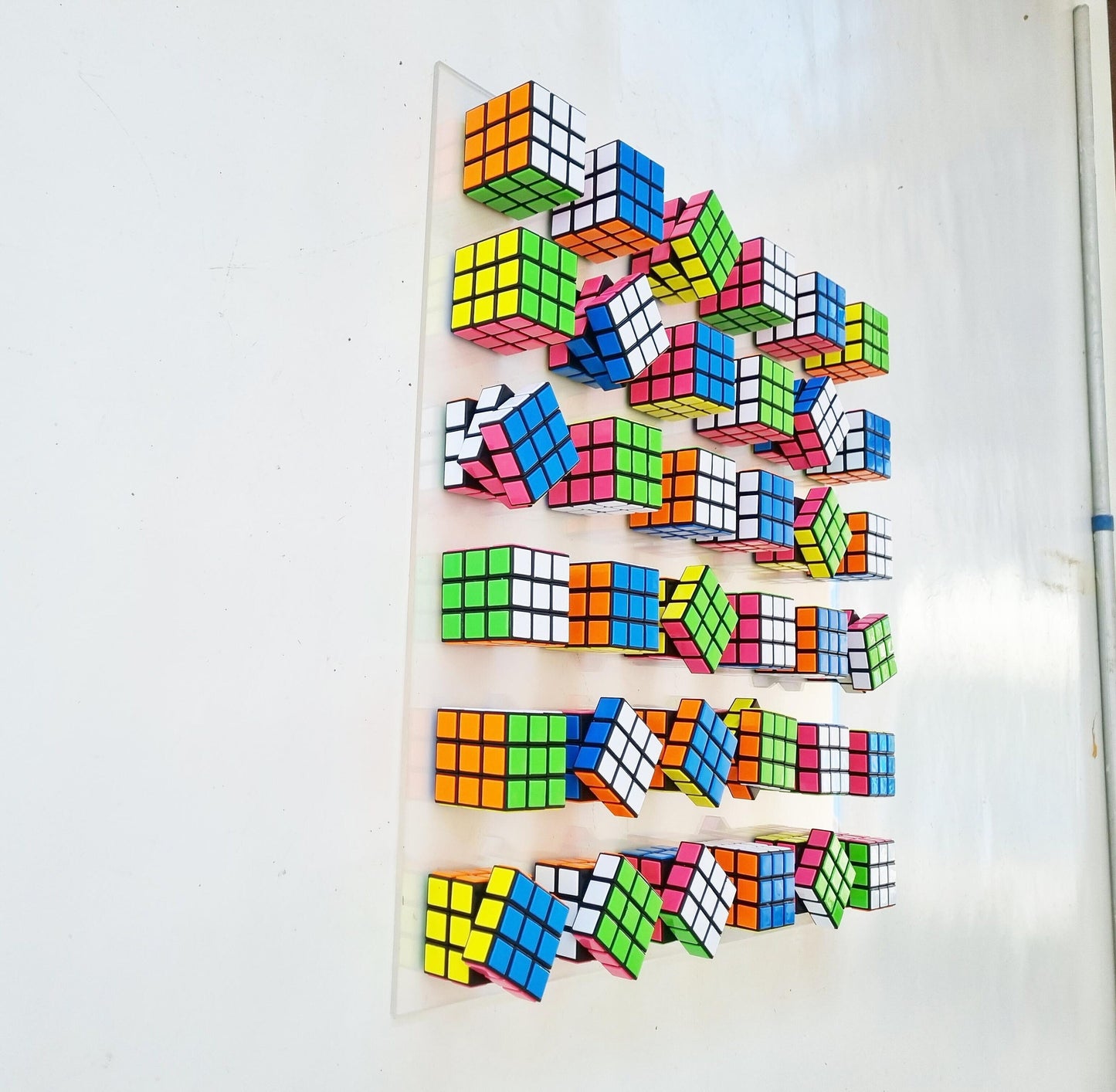 Magic cube puzzle wall piece Unique Rubiks Cube wall art. ©. Original retro vintage toy Rubik cube art piece. 80s nostalgia puzzle picture