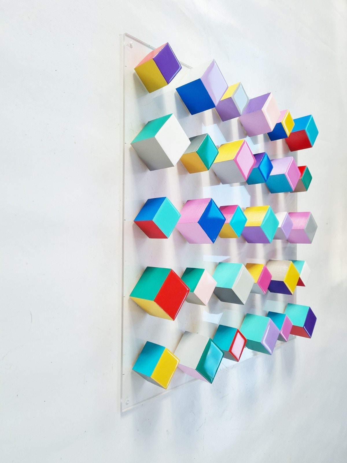 Modern and unique wood wall art. Geometric art. Hand painted with happy colors. Bright Resin finish on top face. Wood Sculpture. Cube art. ©