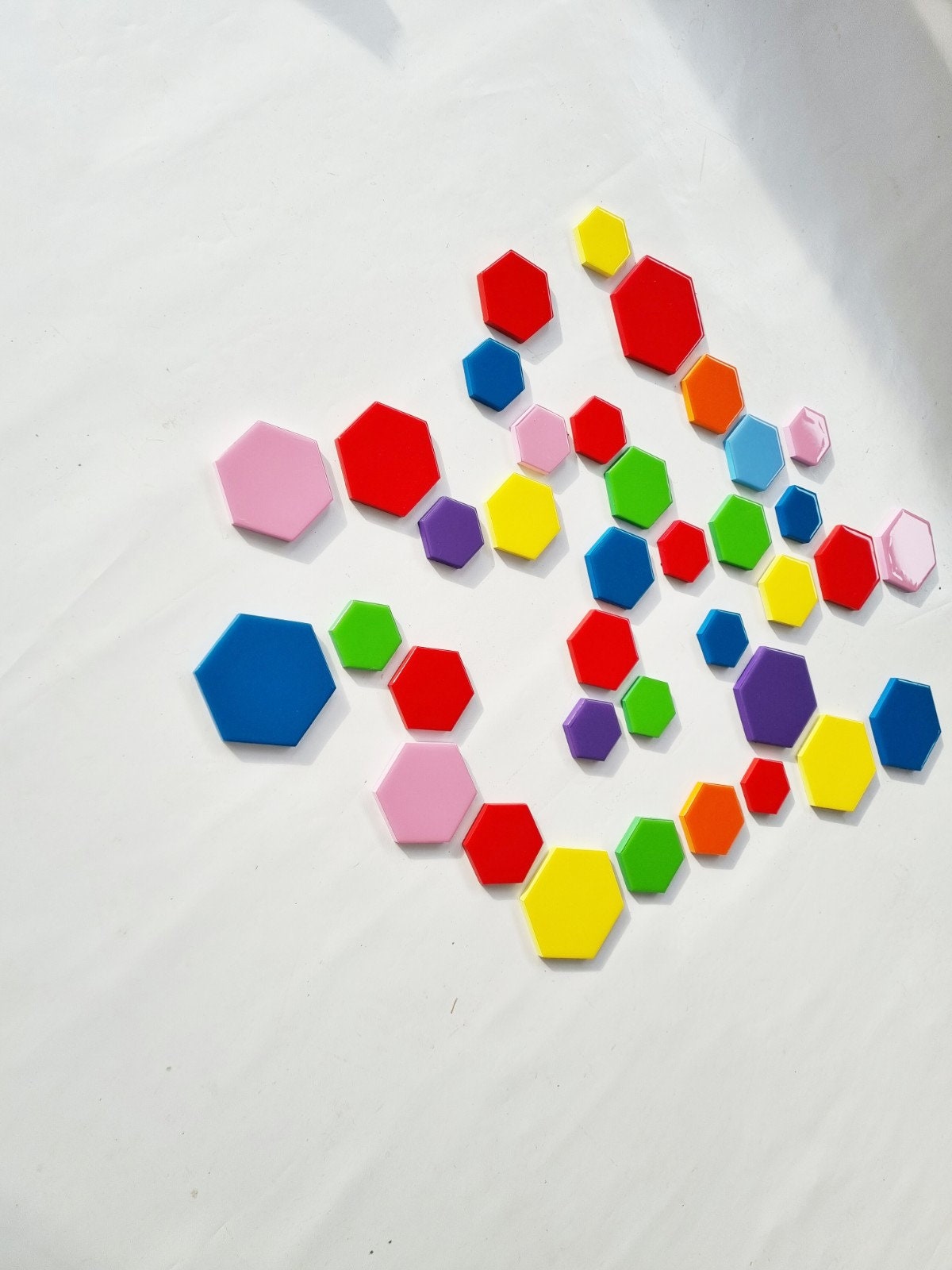 PACKS of hand painted colored wooden hexagons with high quality,shiny epoxy resin front face.Choose the number of Self install wall art ©