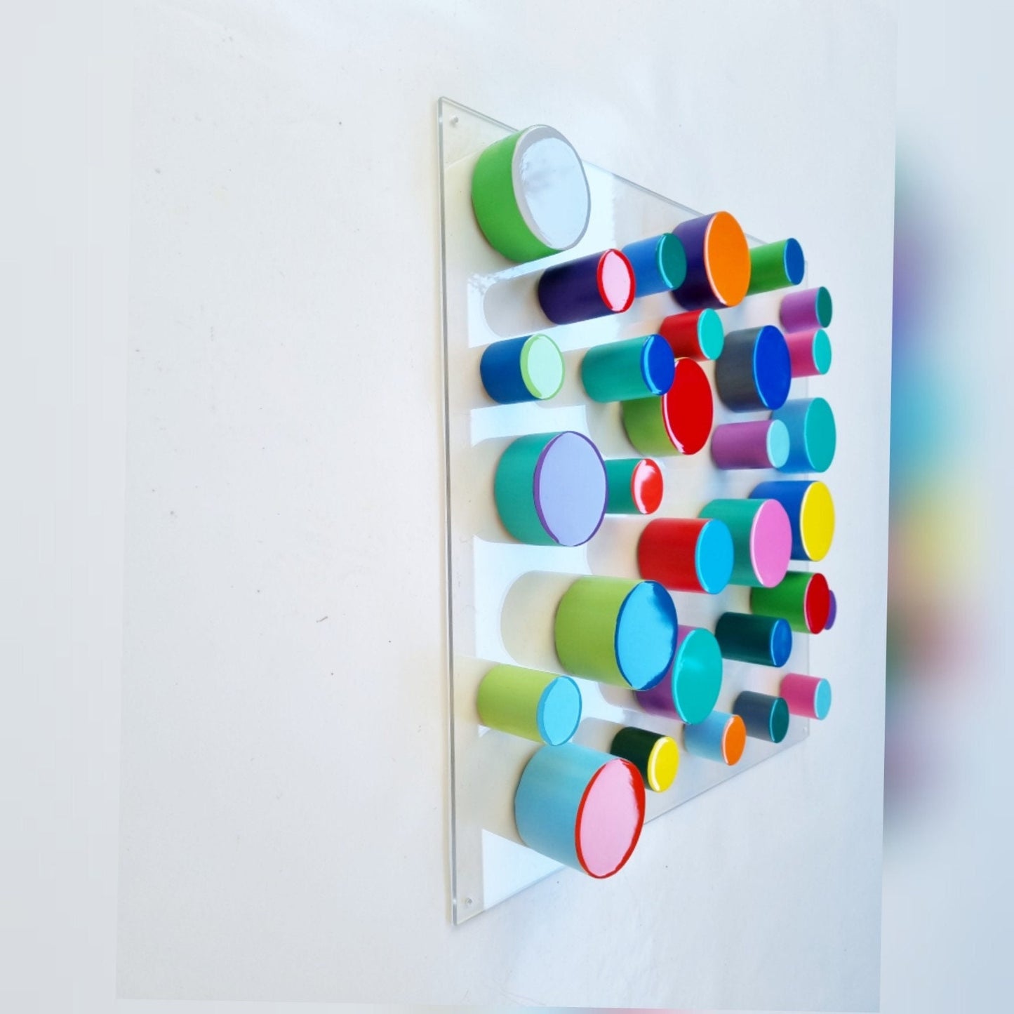 Wood wall art in happy colors and resin finish on top. Hand painted cylinders with different heights and sizes. 3d art. Wood sculpture ©