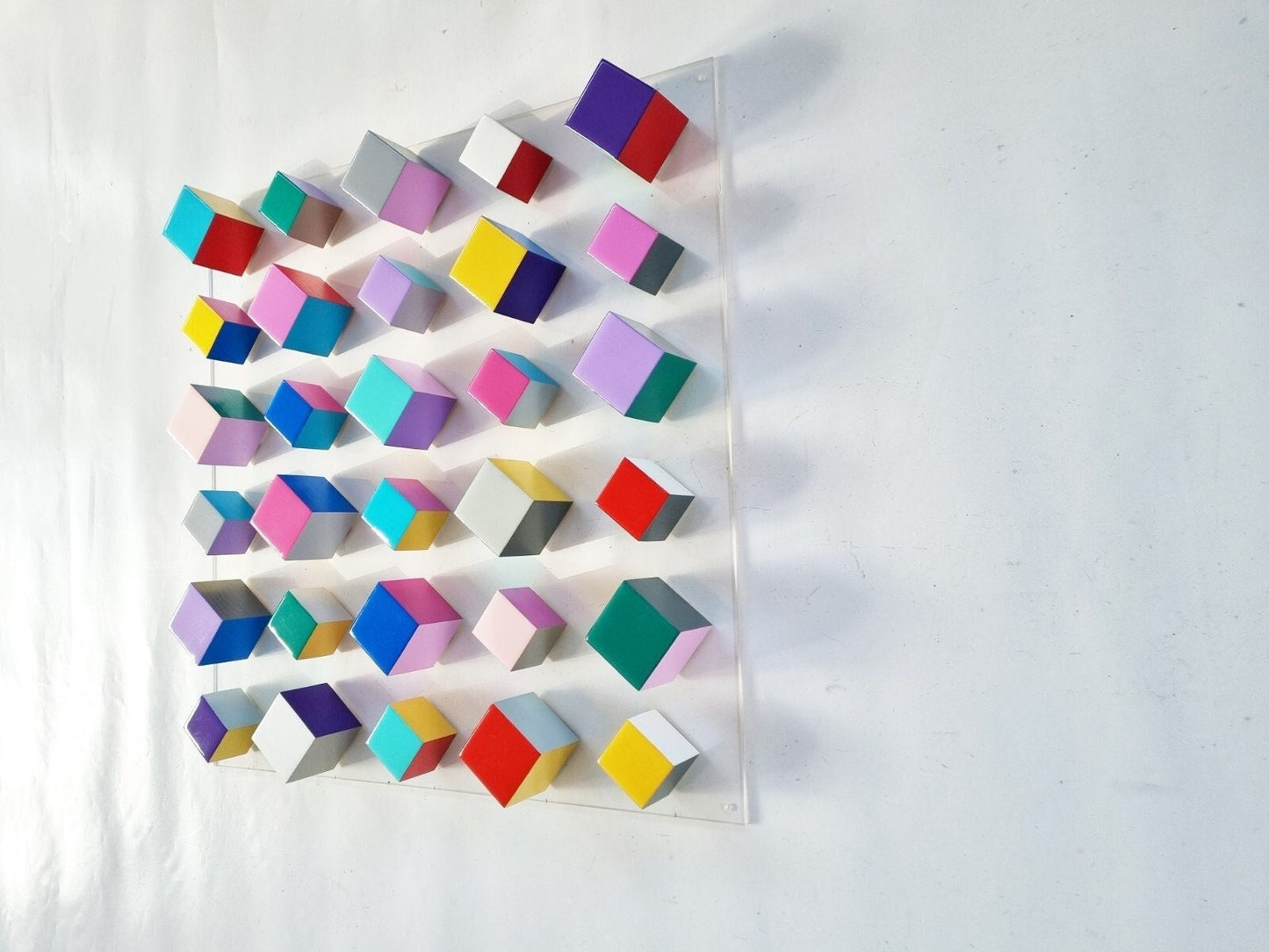 Modern and unique wood wall art. Geometric art. Hand painted with happy colors. Bright Resin finish on top face. Wood Sculpture. Cube art. ©