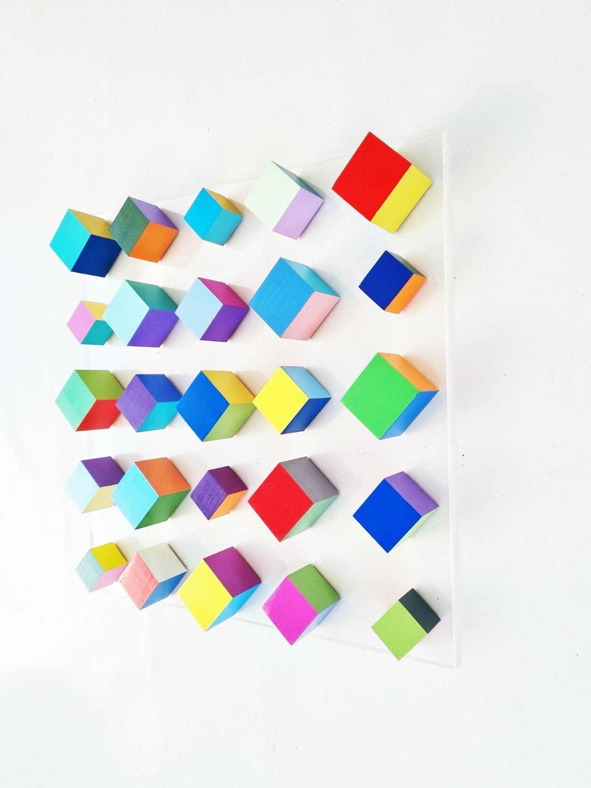 Multi colored wood art in bright and bold happy colors , geometric wood cubes, Abstract and modern wall art. Hand made & hand painted. ©