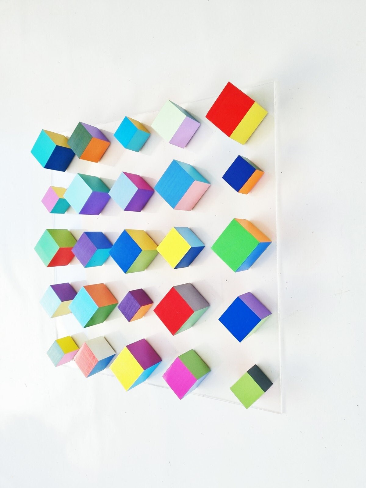 Multi colored wood art in bright and bold happy colors , geometric wood cubes, Abstract and modern wall art. Hand made & hand painted. ©