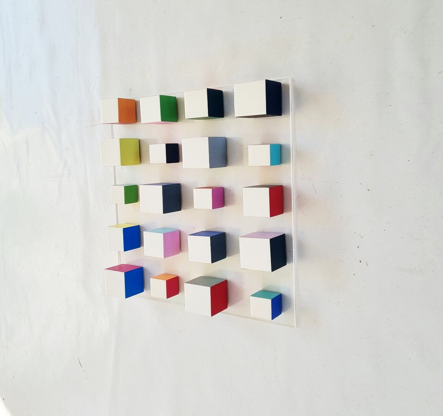 White blocks with resin on top face. Happy colors, 3d wood wall art colorful wooden cubes on acrylic, panel ready to install.