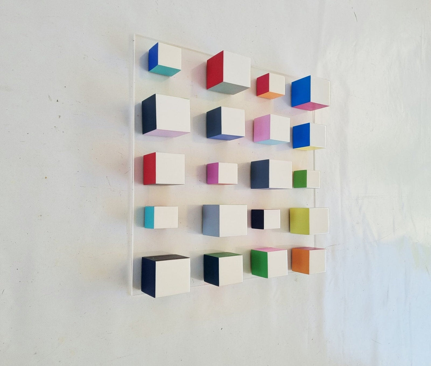 White blocks with resin on top face. Happy colors, 3d wood wall art colorful wooden cubes on acrylic, panel ready to install.