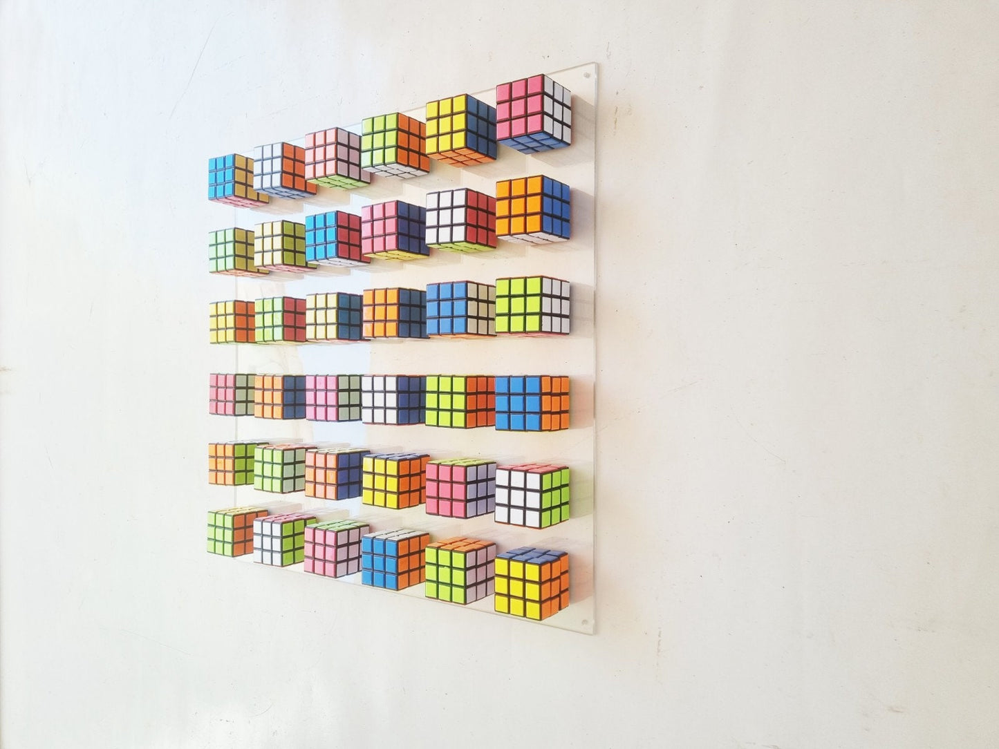 Unique Rubiks Cube wall art. © Magic cube puzzle wall piece. Original retro vintage toy Rubik cube art piece. 80s nostalgia puzzle picture.