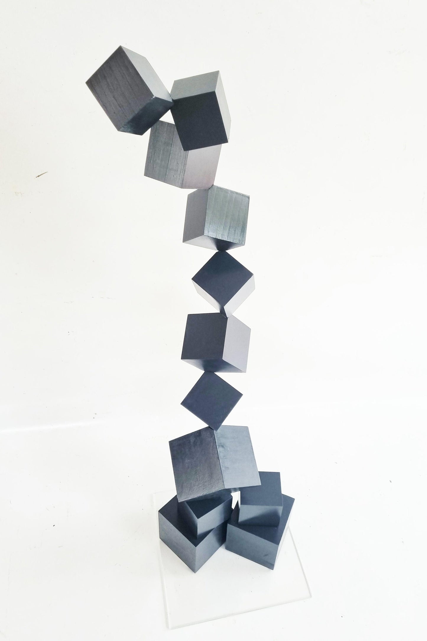 Black sculpture. Hand-painted wooden blocks in glossy black, finished with varnish. Perfect design for modern decoration. Unique design ©