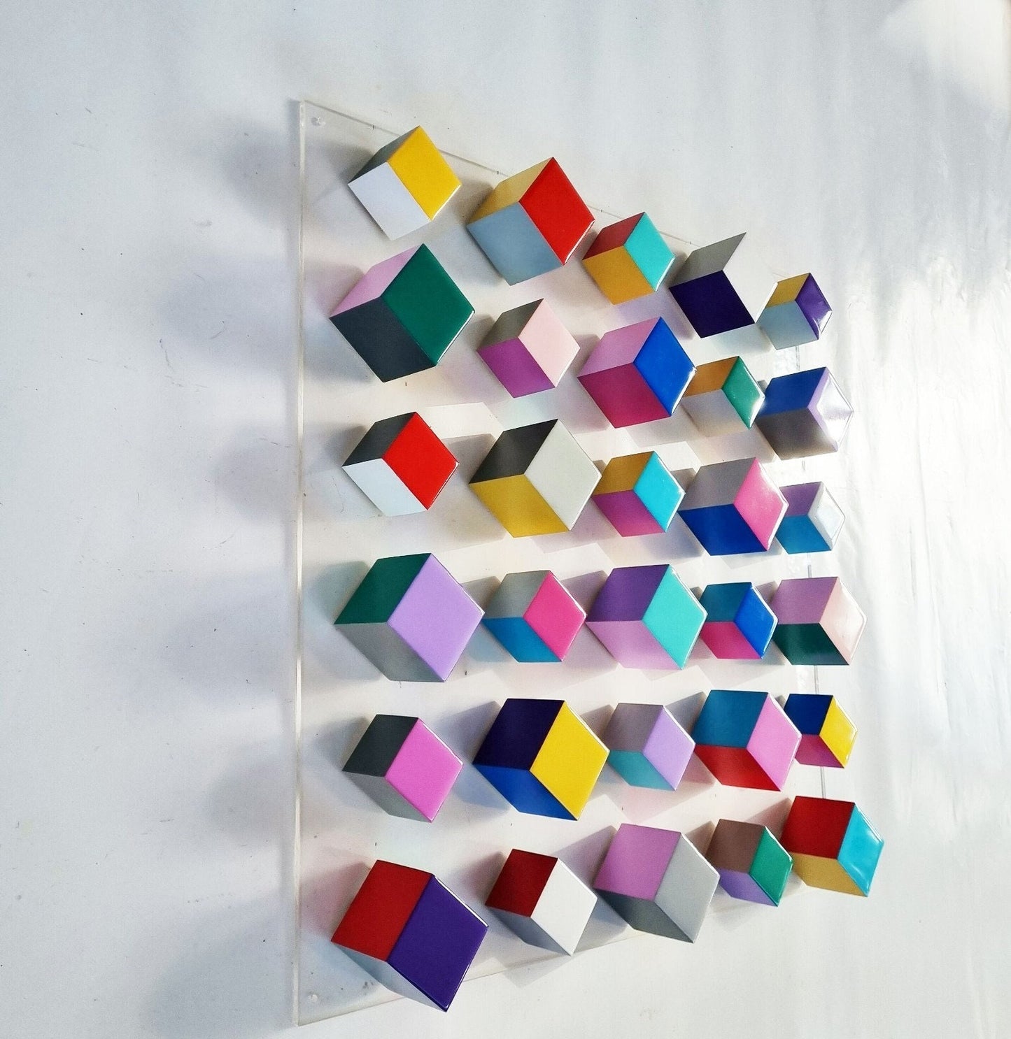 Modern and unique wood wall art. Geometric art. Hand painted with happy colors. Bright Resin finish on top face. Wood Sculpture. Cube art. ©